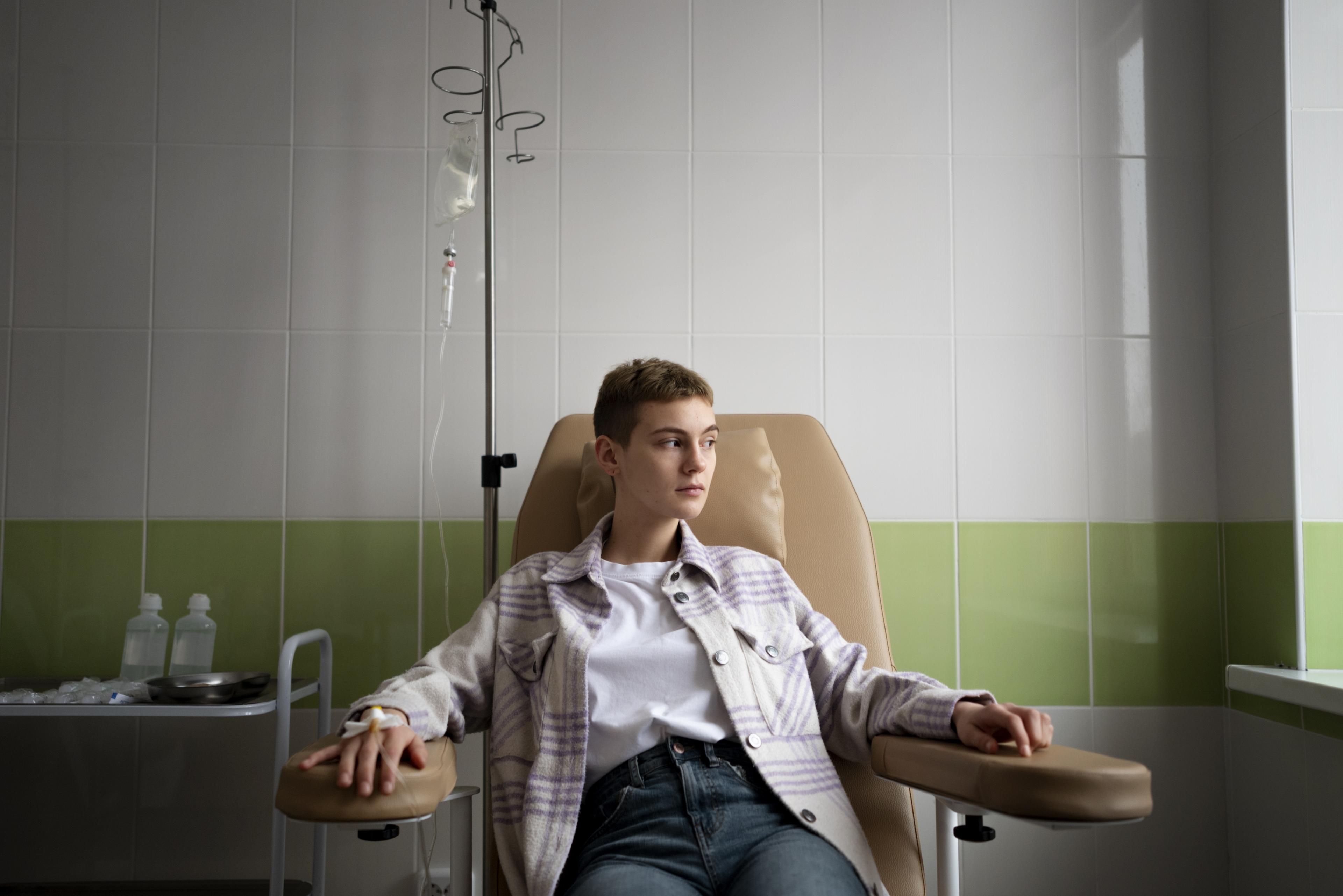 Client receiving hydration IV therapy at Drip Lounge
